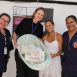 Imagem mostra a Secretária de Saúde Janaina Guerino com uma gestante e duas enfermeiras, recebendo seu kit do Projeto Bem Te Vi