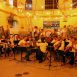 Imagem mostra a orquestra de viola caipira em evento anterior no Mercado Municipal