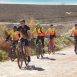 Imagem mostra ciclistas pedalando em rota turística na edição anterior do Passeio Ciclístico Rural